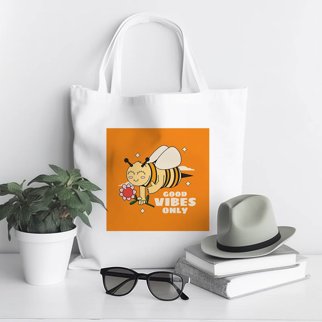 Custom printed tote bag with a cute bee design and "Good Vibes Only" text, for custom small tote bags.